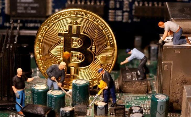Rows of ASIC miners in a large mining farm facility, showing effective cooling solutions.