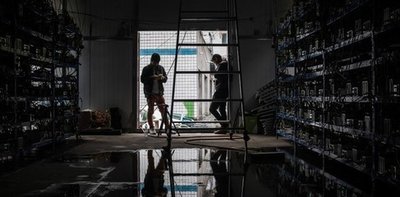 Massive cryptocurrency mining farm with rows of Xema M70S rigs